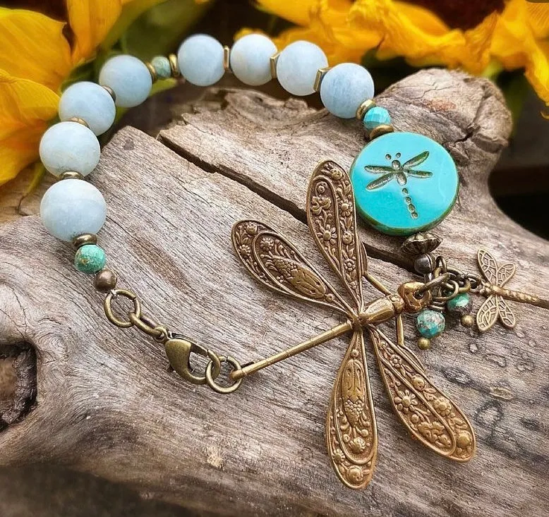 Dragonfly. Aquamarine stone, dragonfly charm, bronze metal bracelet.