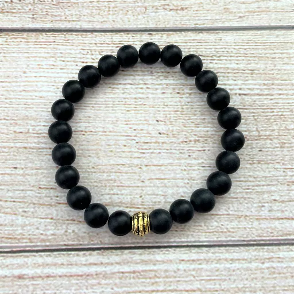 Mens Black Onyx Matte Beaded Bracelet with Gold Statement Bead