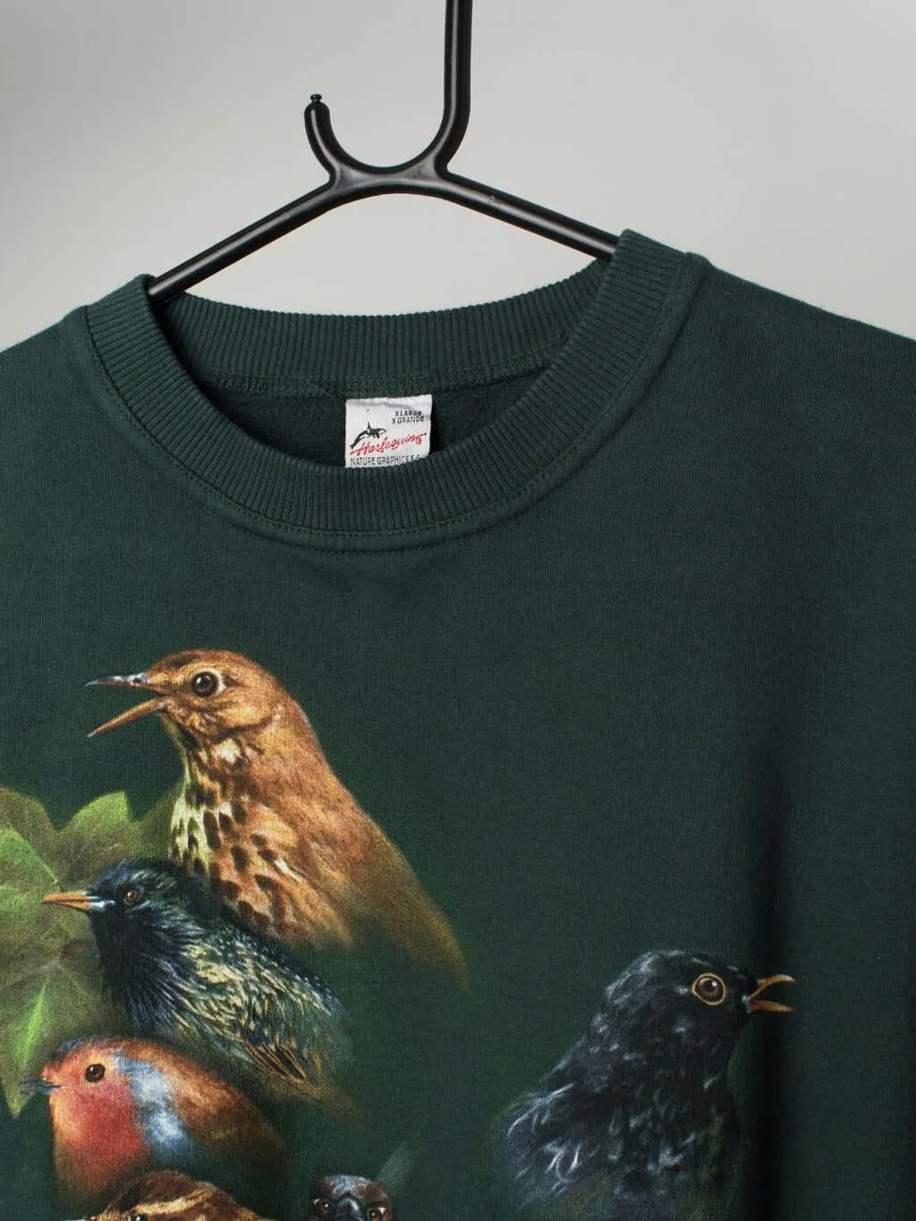 Vintage forest green sweatshirt with bird graphics, 90s – XL